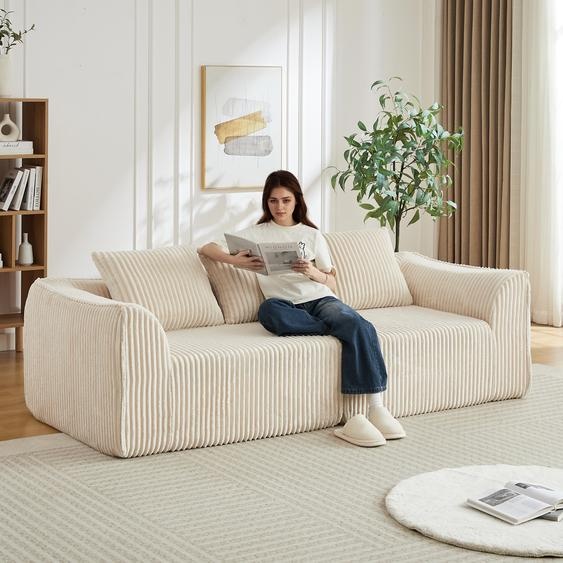 Canapé minimaliste en velours côtelé de 235 cm aux lignes courbes et au dossier légèrement incliné, livré avec deux coussins, beige