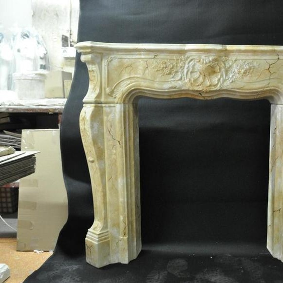 Cheminée Habillage de poêle Encadrement style marbre Décoration baroque Cheminées classiques