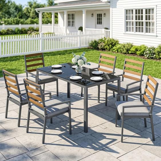 Ensemble de mobilier de jardin composé de 7 pièces : une table et 6 chaises. La table est équipée dun plateau en verre. Les chaises sont rembourrées avec un rembourrage de 5 cm. Dimensions : 146 x 80 x 74 cm. Couleur : noir