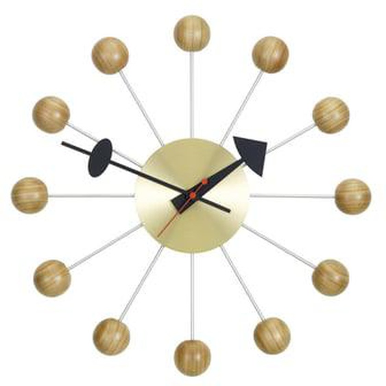 Horloge Ball Clock - cerisier