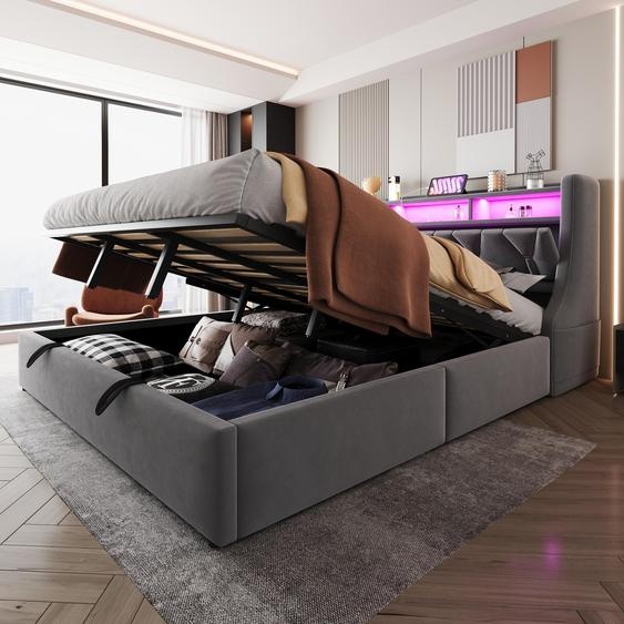 Lit rembourré Fortuna Lai 180 x 200 cm, lit coffre hydraulique, tête de lit rembourrée rabattable avec espace de rangement, prise électrique et compartiment de rangement, éclairage LED, pieds de lit élargis, tissu velours gris, ancienne référence