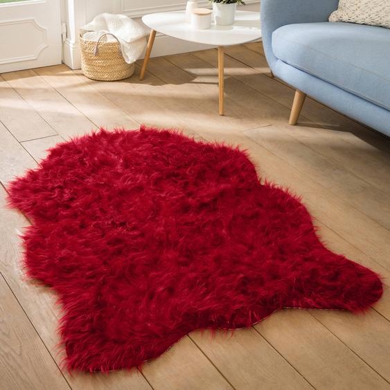 Tapis poils forme peau de bête -